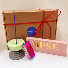 Load image into Gallery viewer, Gift box with an incense holder, box of incense, and an electric lighter on a light background