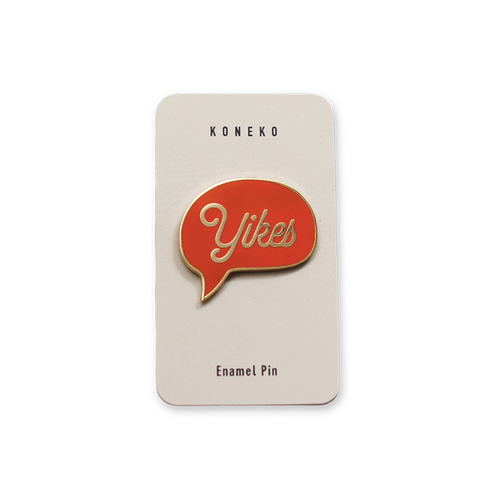 gold and orange enamel pin