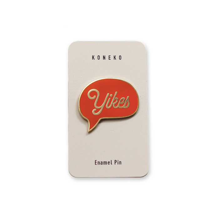 gold and orange enamel pin